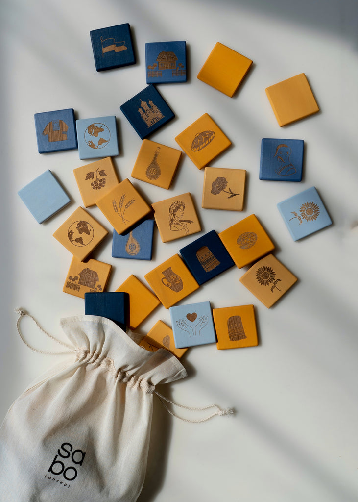 Ukrainian matching card game memory block wooden symbol flag blue yellow sabo concept donation kids children gift educational