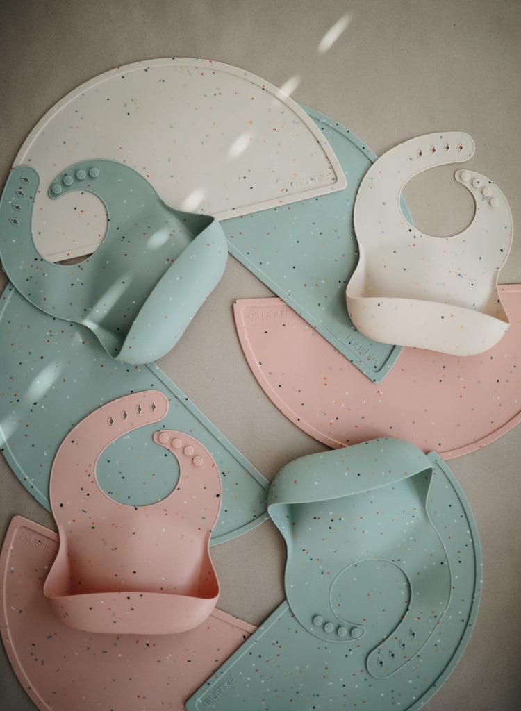 Mushie silicone baby bib pocket meal time baby led weaning toddler confetti cambridge blue spoon fork plate bowl mat